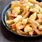 This is my take on Canadian Poutine, and it is delicious! cookingwithcurls.com