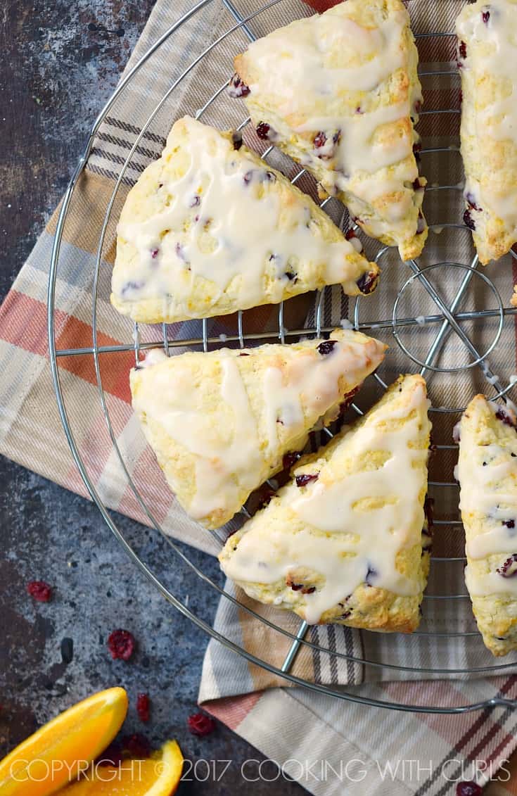 These Cranberry-Orange Scones are tender, delicious, and studded with tart cranberries! COPYRIGHT © 2017 COOKING WITH CURLS