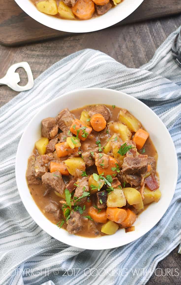 Warm up this winter with a bowl of this hearty, Instant Pot Irish Beef Stew! COPYRIGHT © 2017 COOKING WITH CURLS