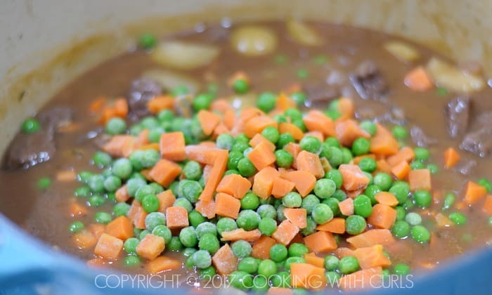 Peas and carrots added to the steak and vegetable filling.