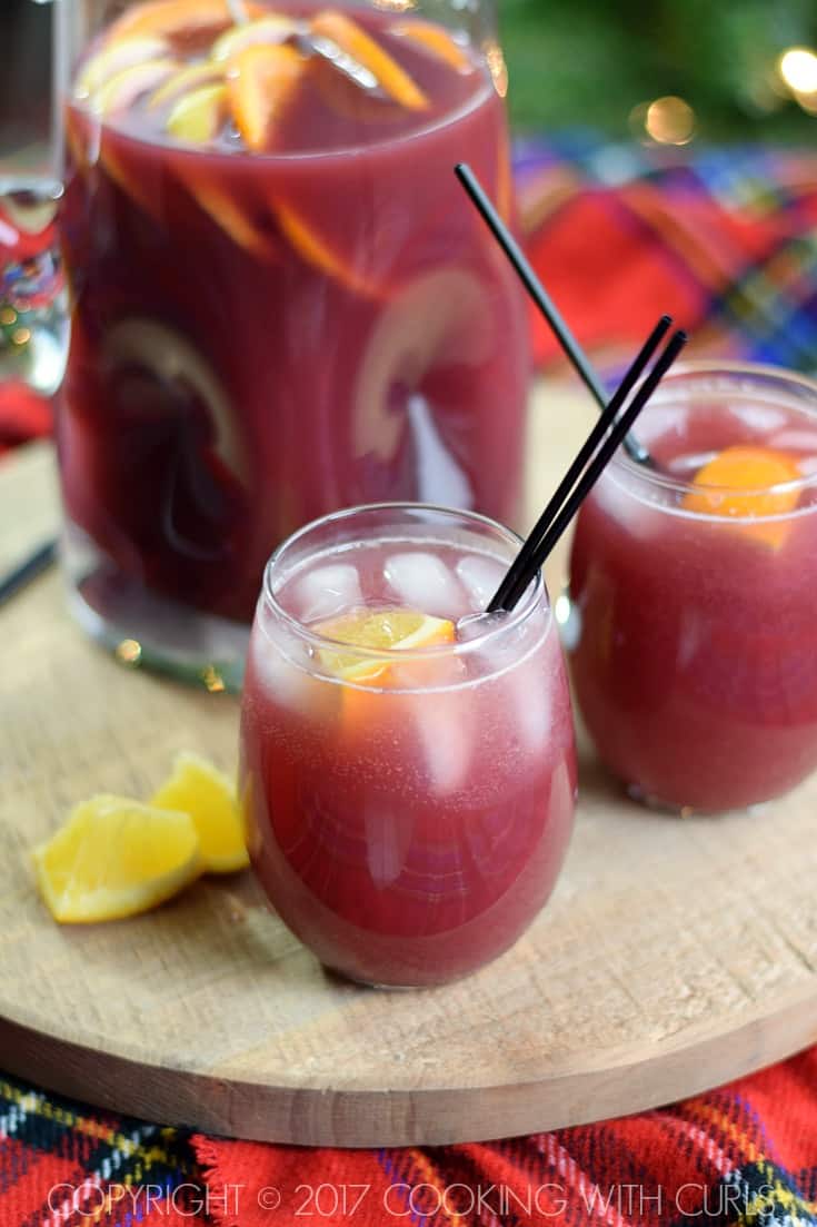 This Pomegranate Orange Holiday Punch is super easy to prepare and sure to be a huge hit at your next party! COPYRIGHT © 2017 COOKING WITH CURLS
