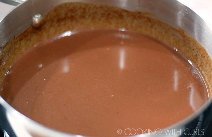 Boozy Peppermint Hot Chocolate in a sauce pan.