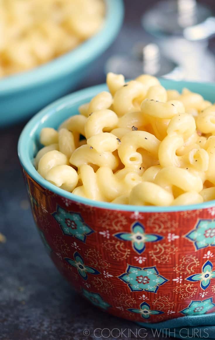 Rich and creamy Instant Pot Macaroni and Cheese in a small red decorative bowl.