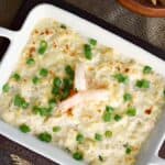 You can throw this Simple Seafood Artichoke Dip together in minutes, then bake it to golden perfection! © 2017 COOKING WITH CURLS