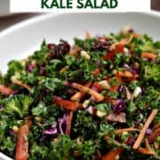 Chopped kale salad in a bowl with a container of dressing and large bowl of salad in the background and title graphic across the top.