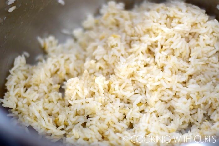 Instant Pot Fried Rice fluff rice with a fork