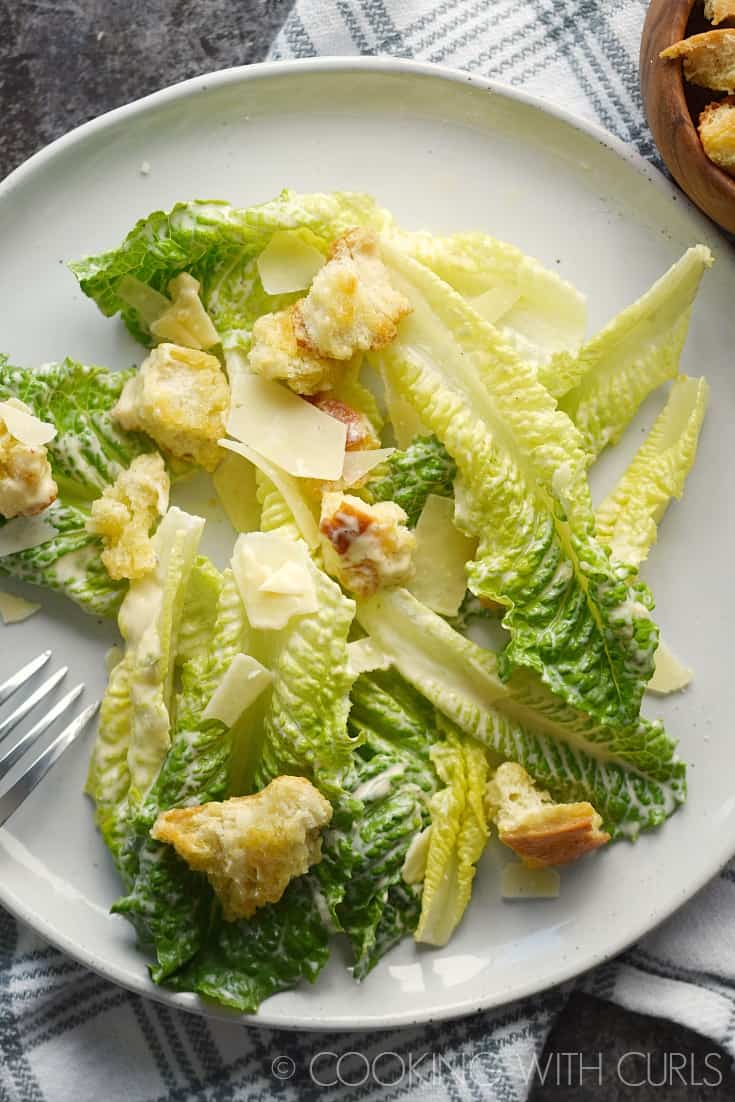 This Classic Caesar Salad is light, delicious, and easy to make. It is the perfect start to any meal! © COOKING WITH CURLS