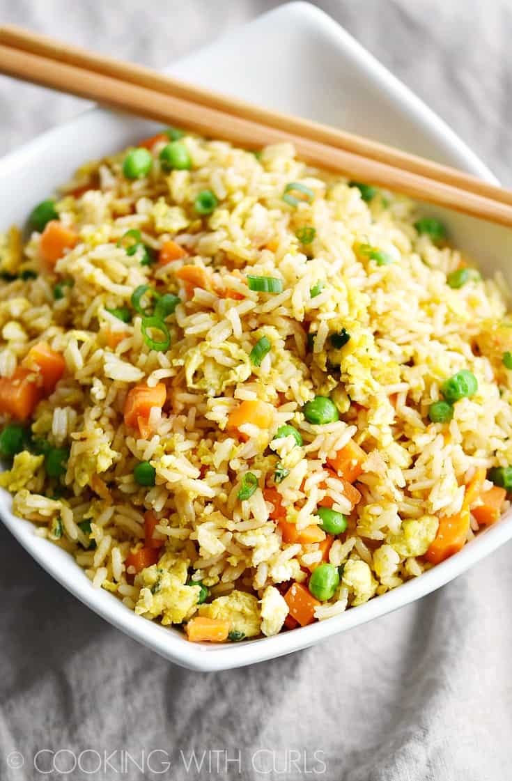 You won't believe how easy this Instant Pot Fried Rice is to prepare! It's the perfect side dish or quick meal any night of the week! © COOKING WITH CURLS