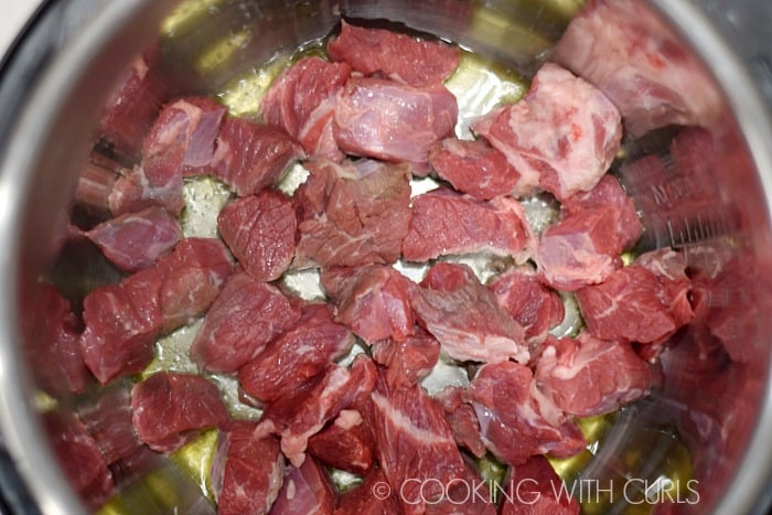 Brown the beef chunks in batches