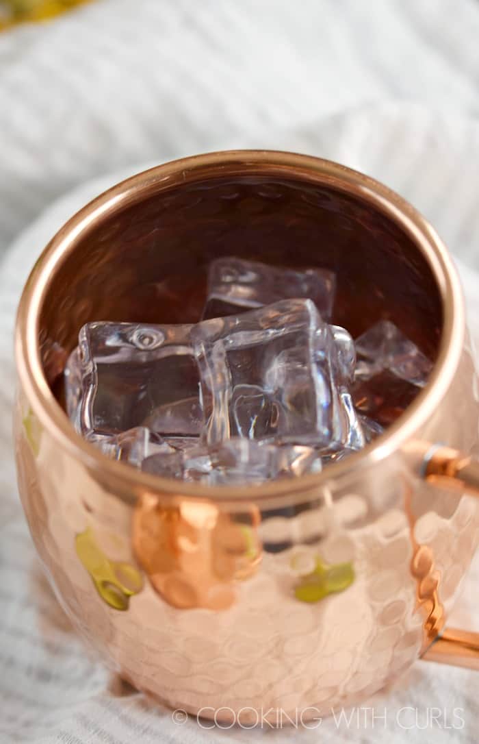 Ice cubes in a copper mug.