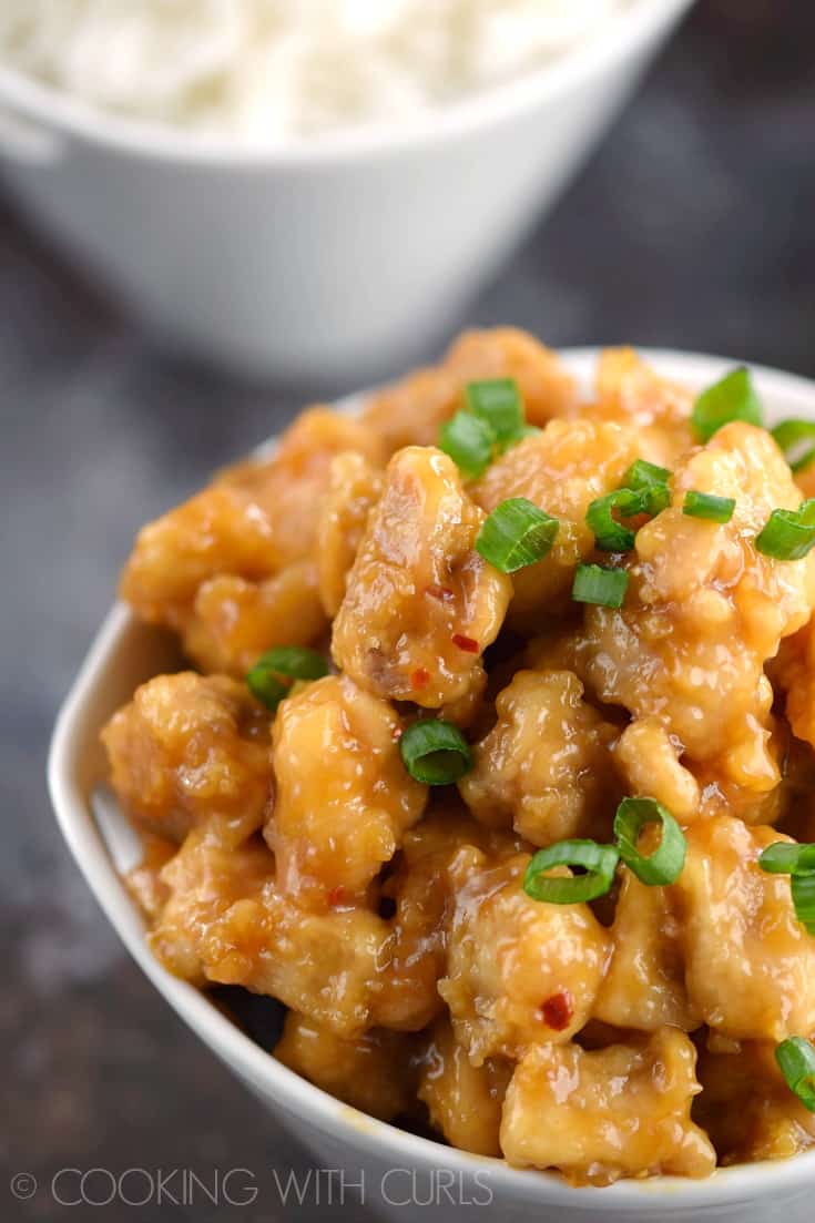 Impress your family with your mad skills and serve them Chinese Orange Chicken for dinner tonight! © COOKING WITH CURLS