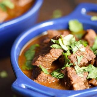 Instant Pot Chunky Beef Chili with no beans or tomatoes in small blue bowls