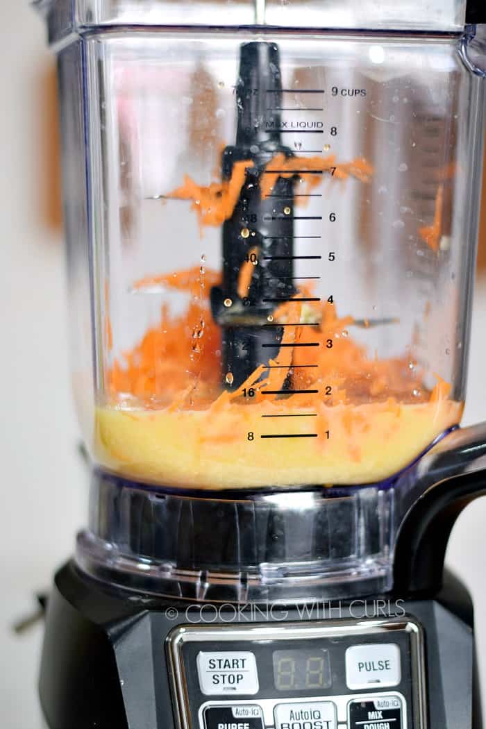 blender with shredded carrots orange juice and miso © COOKING WITH CURLS