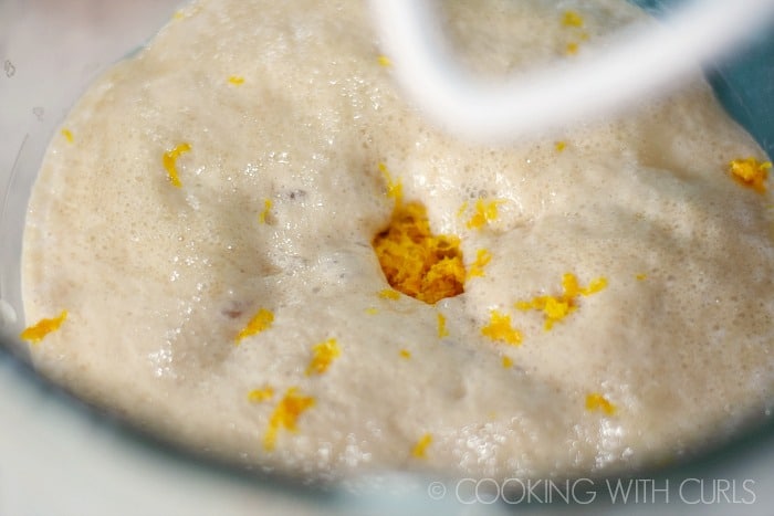 Add the sugar and orange zest to the proofed yeast in the bowl © COOKING WITH CURLS