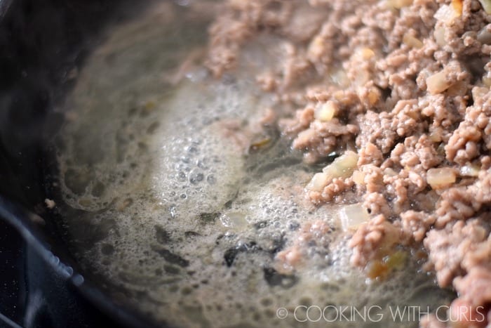 Drain the fat from the skillet © COOKING WITH CURLS