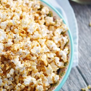 Taco Popcorn is a savory snack that your party guests and family will love! © COOKING WITH CURLS