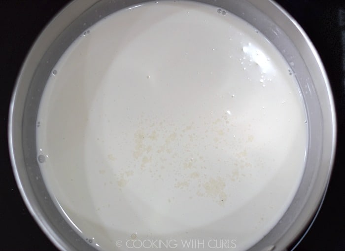 Milk, cream, and sugar in a large saucepan.