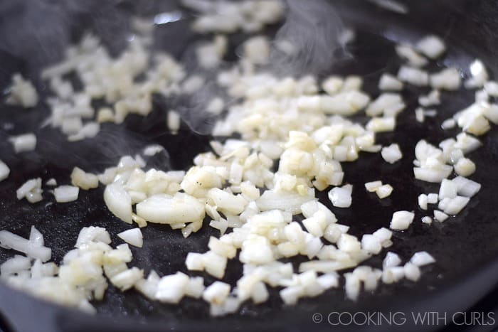 Saute onion in a large skillet © COOKING WITH CURLS