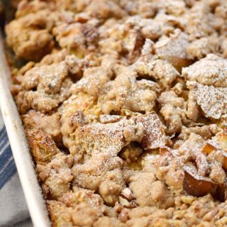 Waking up in the morning just got sweeter with this easy Cinnamon French Toast Bake baking in the oven! © COOKING WITH CURLS