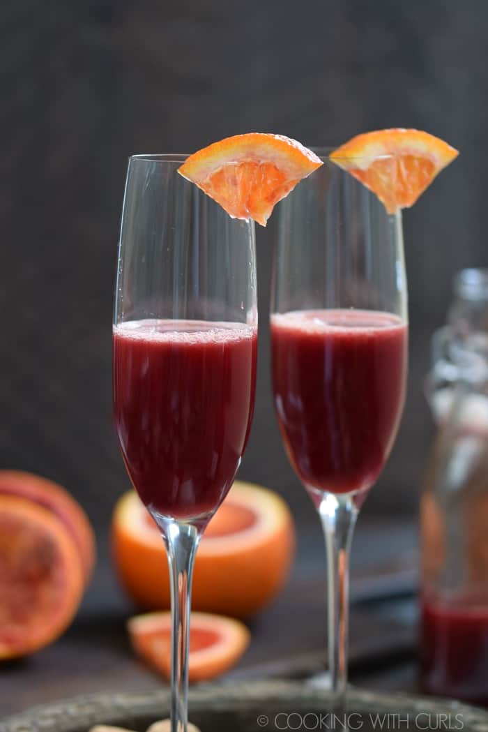 Add blood orange juice to the champagne flute © COOKING WITH CURLS