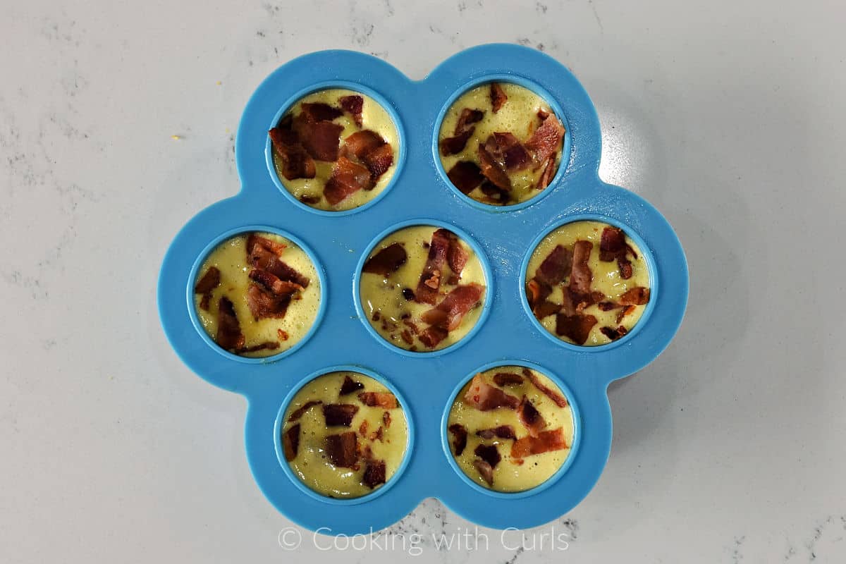 Chopped-bacon-and-eggs-in-silicone-mold.