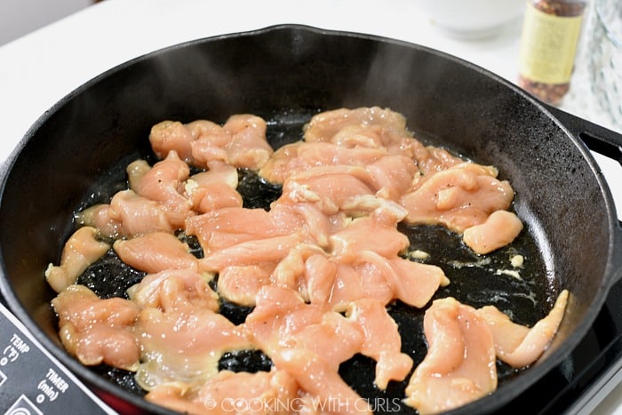 Cook the chicken pieces in a large skillet © COOKING WITH CURLS