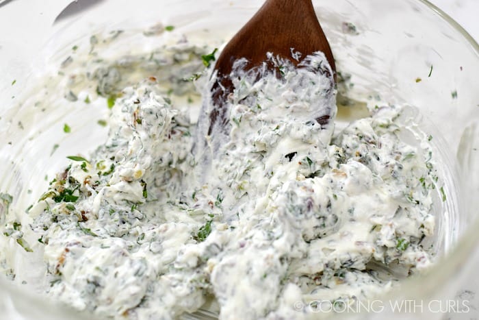 Stir the Greek yogurt into the herb mixture © COOKING WITH CURLS