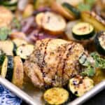 This Sheet Pan Greek Chicken Dinner is quick, easy, and loaded with flavor! © COOKING WITH CURLS