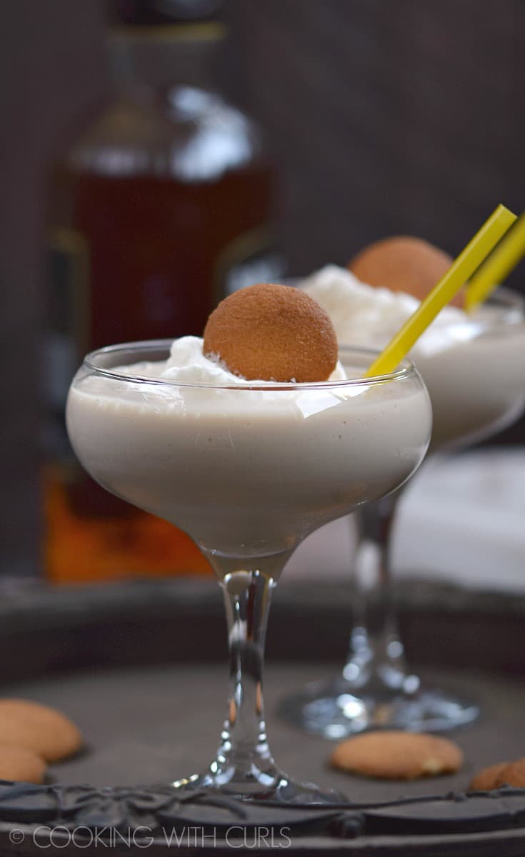 This rich and creamy Southern Banana Cream Cocktail is decadent enough to be classified as dessert, and has enough kick to keep it a cocktail! © COOKING WITH CURLS