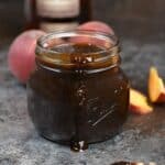 This thick and tangy Peach Bourbon Barbecue Sauce gets it's sweetness from ripe peaches and it's tang from bourbon to create an amazing absolutely sauce! © COOKING WITH CURLS