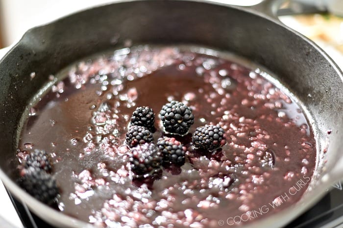 Add the bourbon, preserves, and blackberries to the skillet © COOKING WITH CURLS