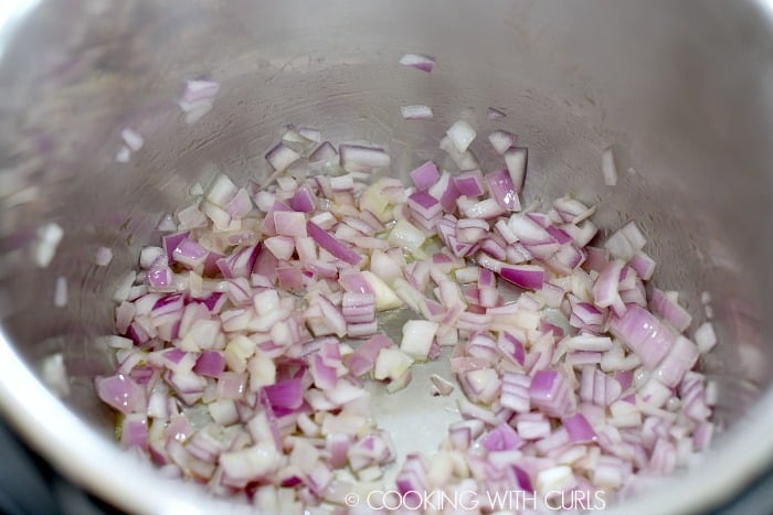 Chopped, red onions in the instant pot.