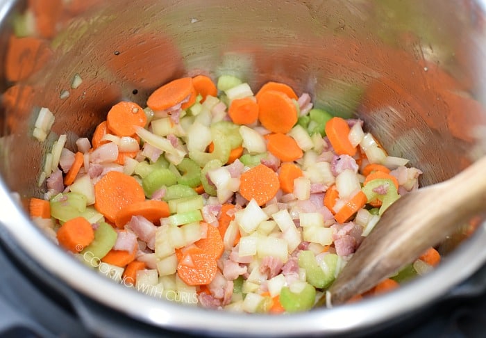 Saute the pancetta, onions, celery and carrots together in the Instant Pot cookingwithcurls.com
