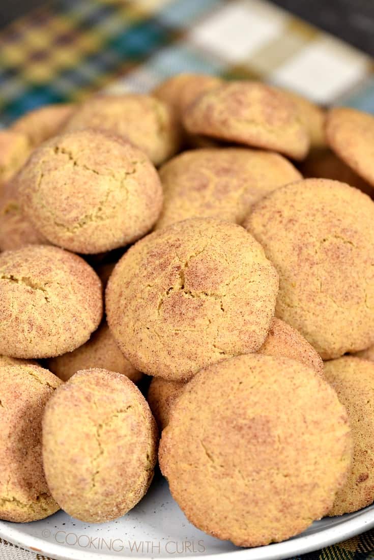 Soft and chewy Pumpkin Spice Snickerdoodles blend together all of fall's favorite flavors! cookingwithcurls.com