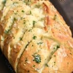 Cheesy Garlic Pull-Apart Bread is always a favorite on game day, at holiday parties, or family dinner! cookingwithcurls.com