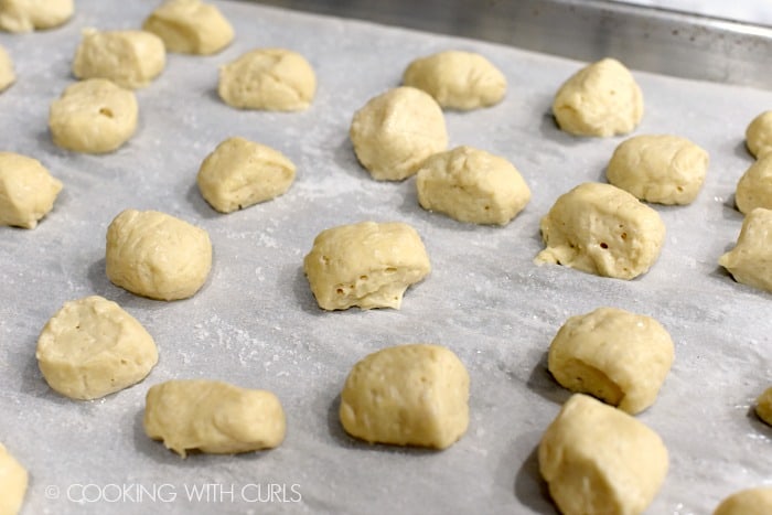 Place the dough bites on a parchment paper lined baking sheet and sprinkle with coarse Kosher salt cookingwithcurls.com