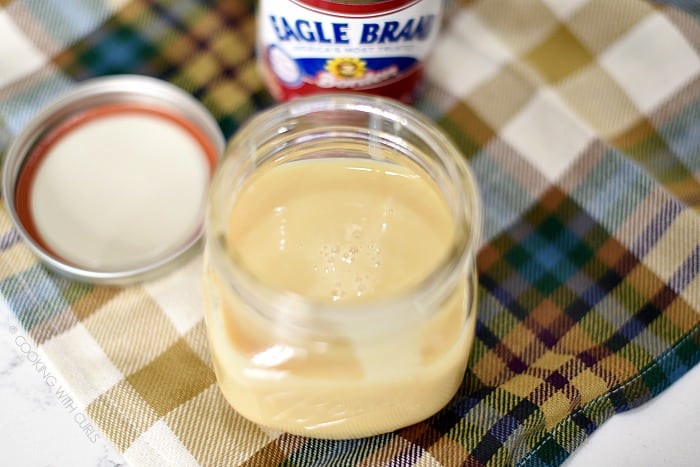 Pour the sweetened condensed milk into a jar cookingwithcurls.com