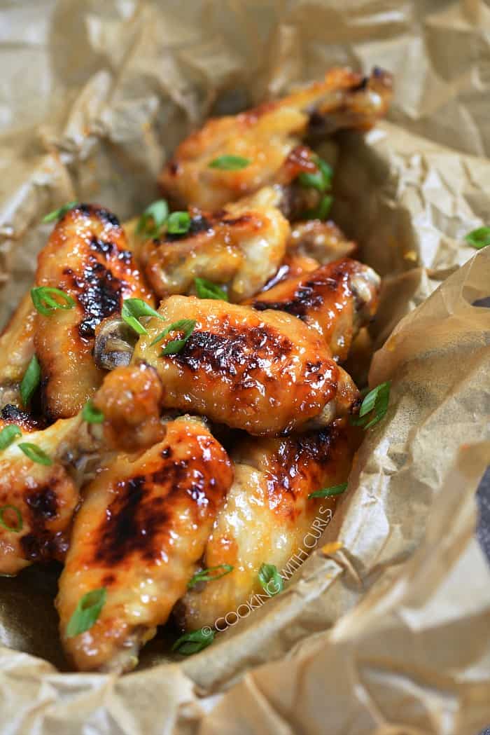 These Apricot Ginger Chicken Wings are finger lickin' good and perfect for your next party! cookingwithcurls.com
