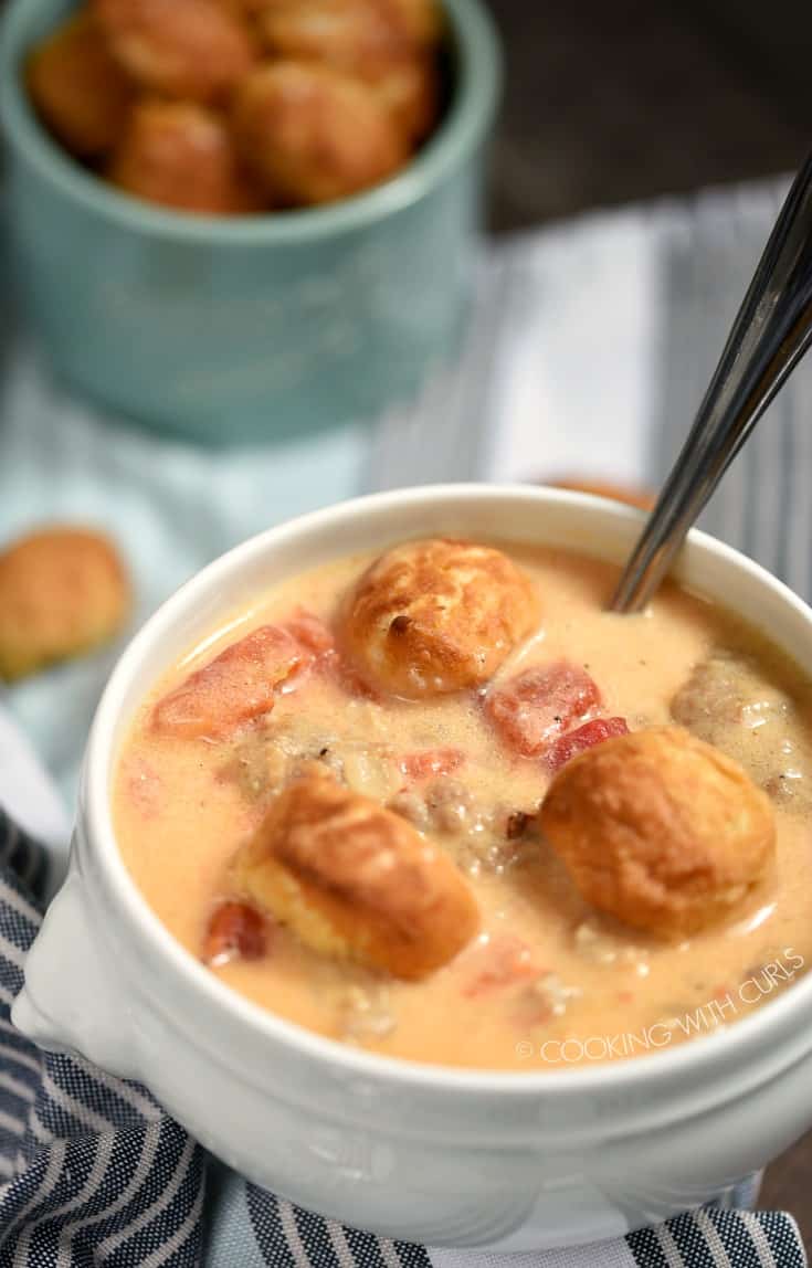 This Beer Brats and Cheese Chowder is thick, creamy and full of flavor! cookingwithcurls.com