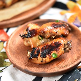 Huli Huli Chicken Wings are an island favorite made easy in your oven! cookingwithcurls.com