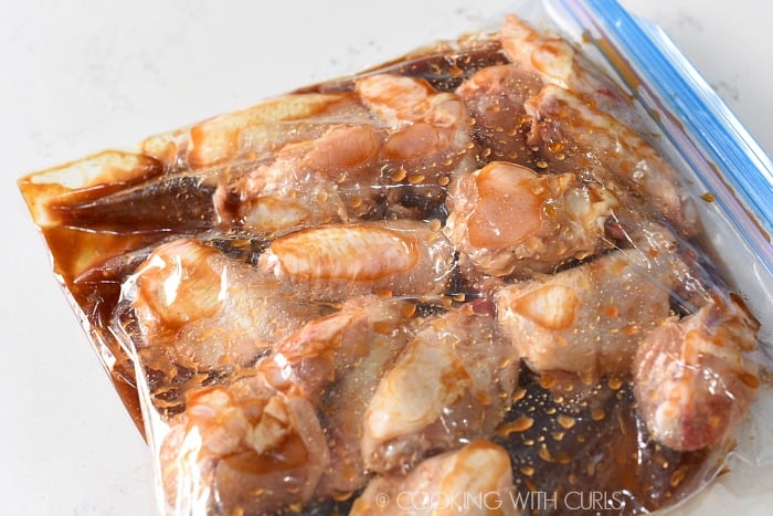 Marinate the chicken wings in a zipper topped bag cookingwithcurls.com