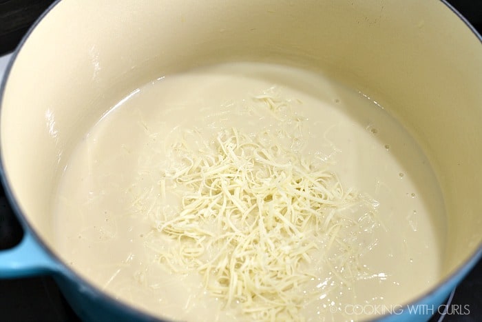 Stir the grated cheese into the sauce cookingwithcurls.com