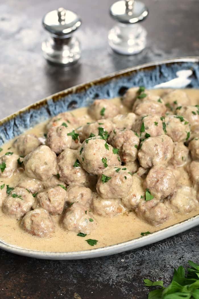 This Swedish Meatball recipe is perfect as an appetizer at a dinner party, or served as a family meal! cookingwithcurls.com