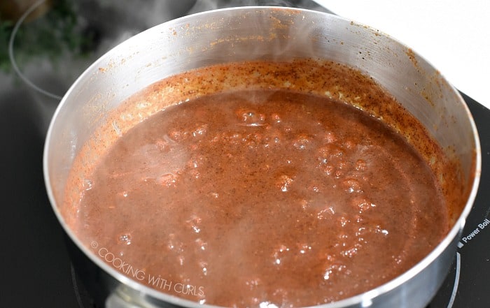 sauce simmering in a saucepan