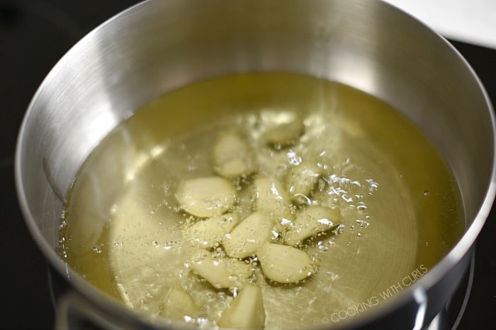 Bring the garlic and olive oil to a boil in a saucepan cookingwithcurls.com