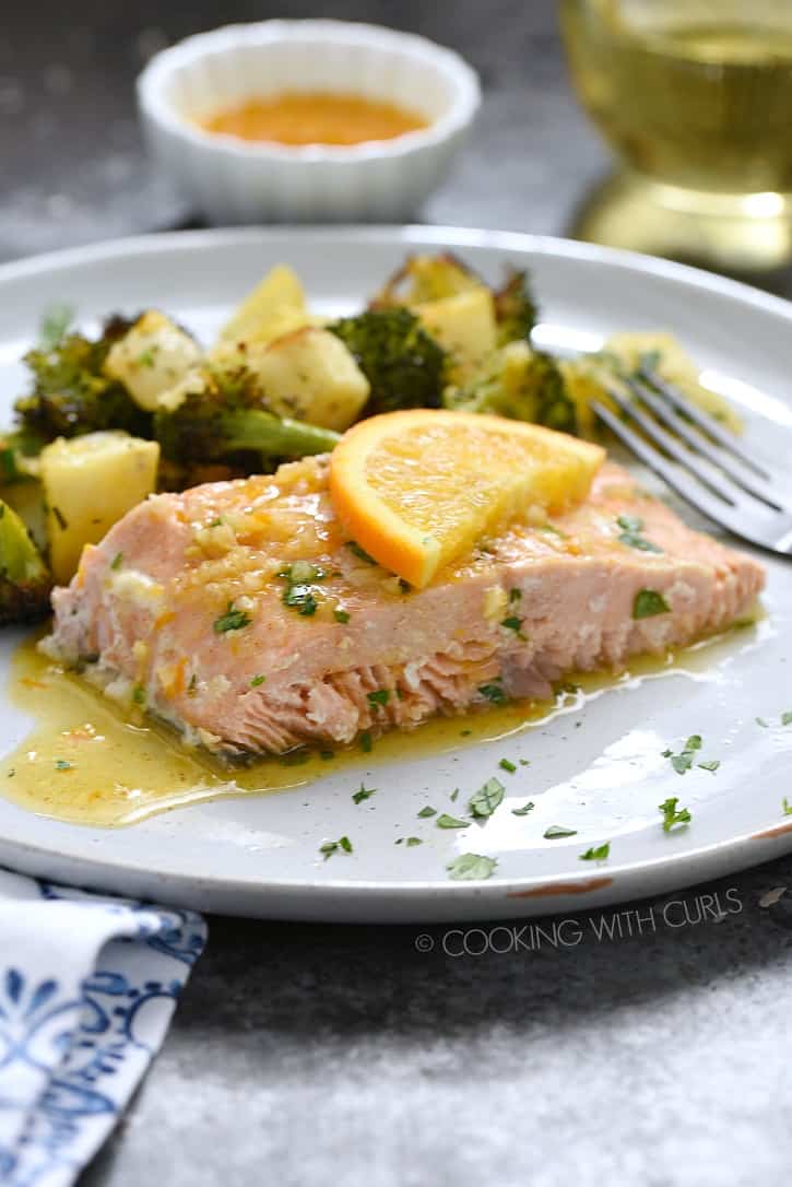 Orange Salmon with Roasted Vegetables is an easy, delicious and healthy meal option that the entire family with love! cookingwithcurls.com