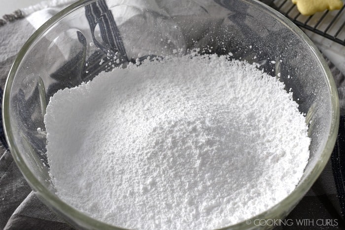 Sift the powdered sugar into a large bowl cookingwithcurls.com