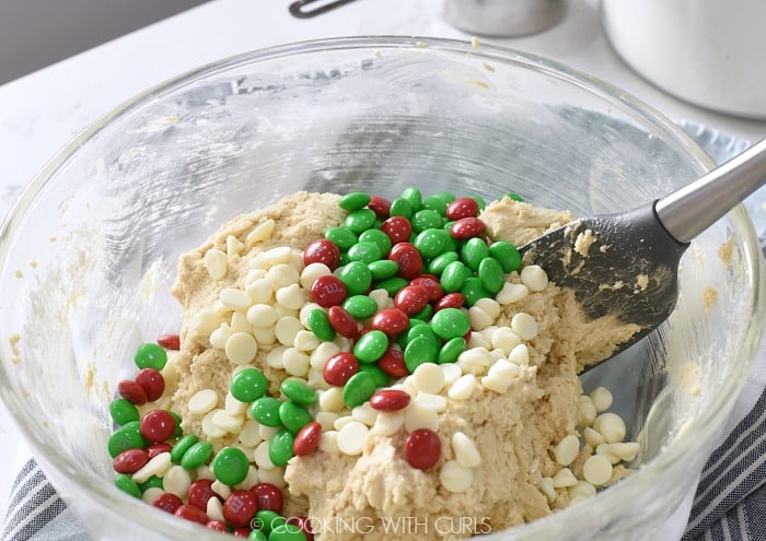 Stir the chocolate chips and m&ms into the cookie batter cookingwithcurls.com