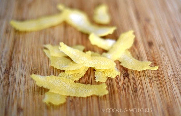 Use a vegetable peeler to create lemon strips cookingwithcurls.com