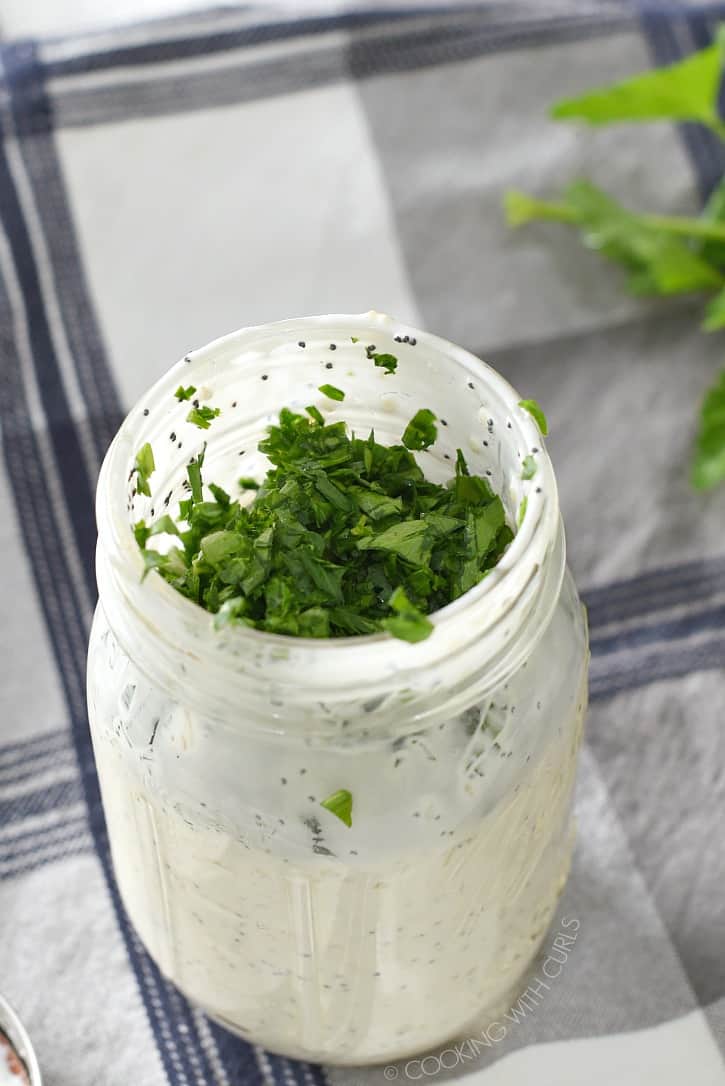 Add the fresh herbs to the everything bagel ranch dressing in the jar cookingwithcurls.com